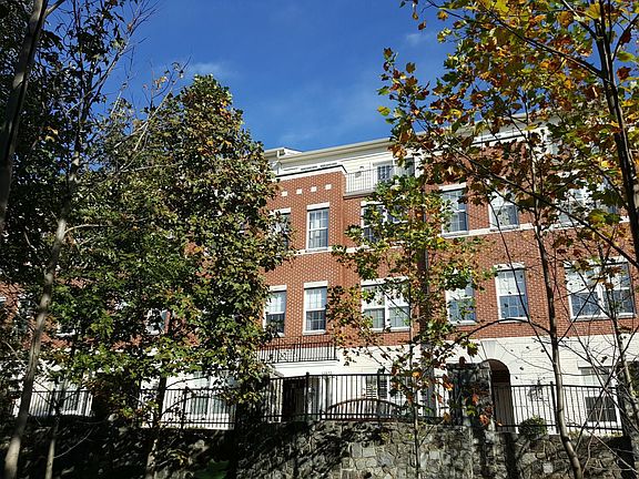 View of front of home from outside courtyard
