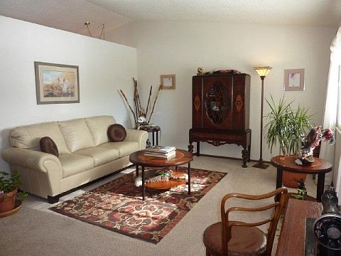 Welcome Home Living Rm Has Vaulted Ceiling wCeiling Fan