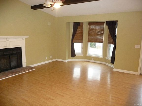 Bamboo laminate floors. Wood Burning Fireplace, Bay window. Very Spacious Living Area.