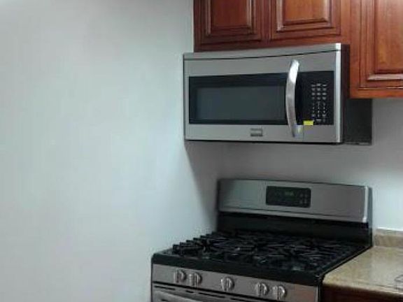 Brand new matching stainless steel appliances including dishwasher.