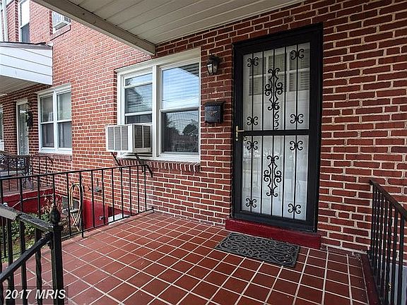 Nicely tiled front porch.