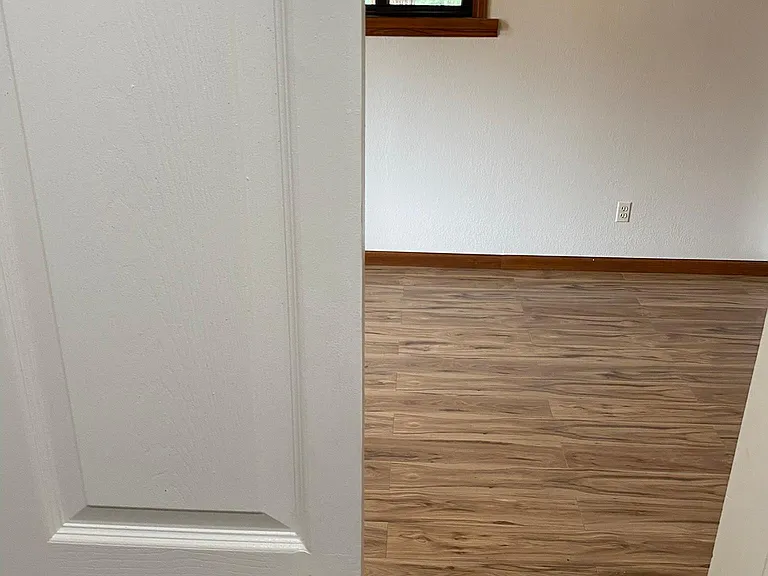 The main bedroom has a separate entrance off the foyer