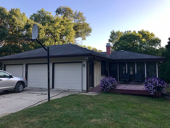 3 car garage, deck and porch