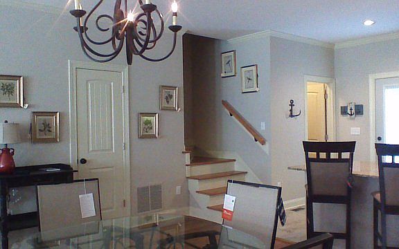 Dinning Room : At garage door looking at stairs to 2nd floor, dinning and pantry/washer room.
