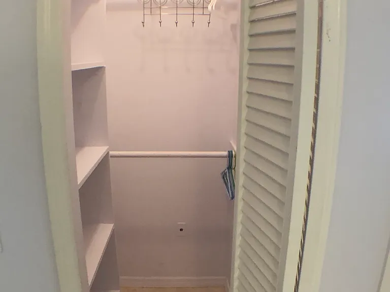 Walk in closet in the master bedroom.