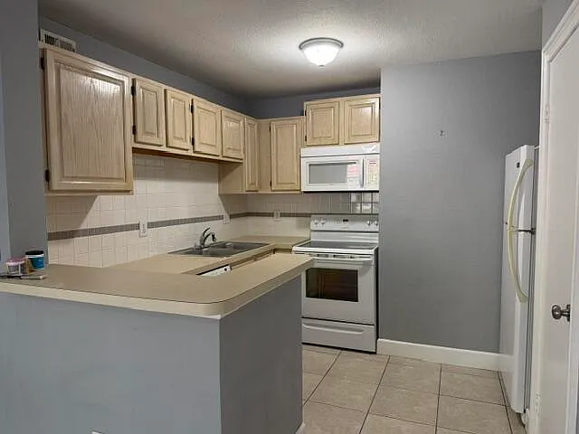 1865 Palm Cove Blvd #9-106 — Photo 14