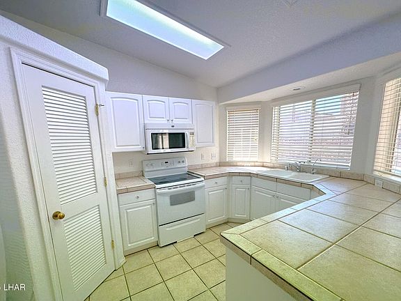 5th image of 2401 Rainbow Ave N