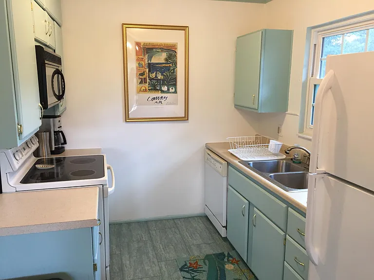 Half of kitchen. New fridge last year and new dishwasher then too.
