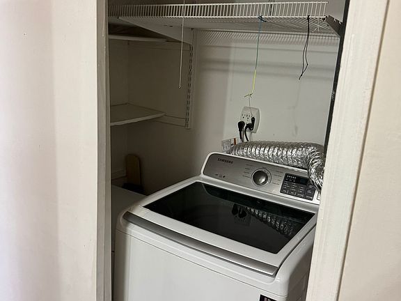 Laundry room with storage