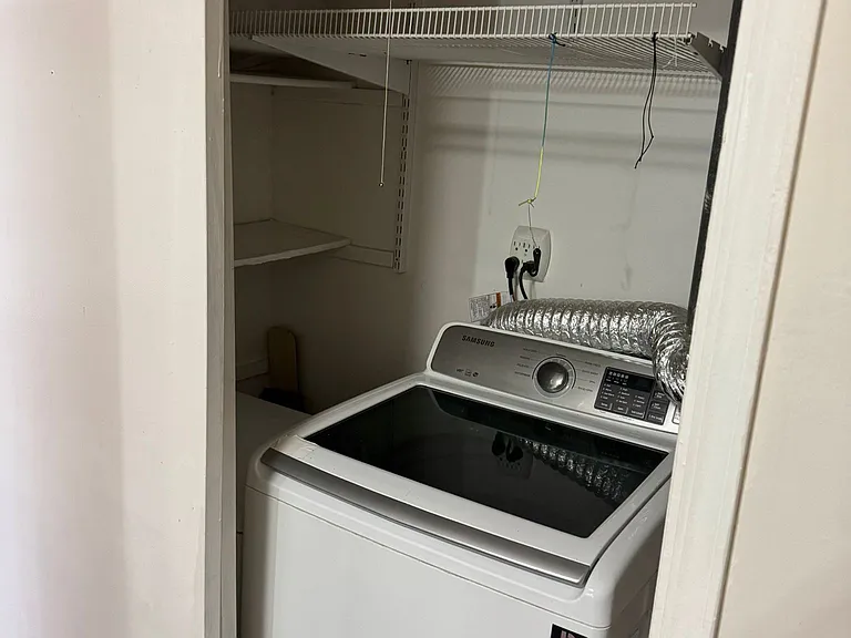 Laundry room with storage