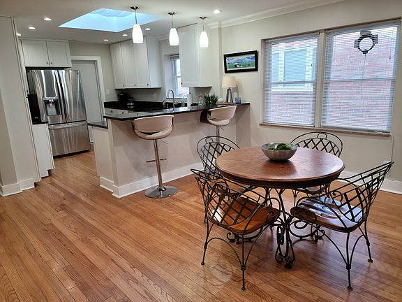 gorgeous kitchen with dining and breakfast bar