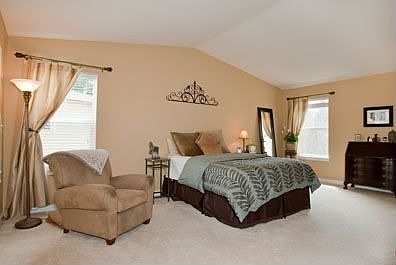Master bedroom with vaulted ceilings