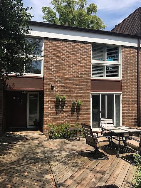 House front and sunny patio
