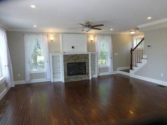 Large Open Living Room with F/P