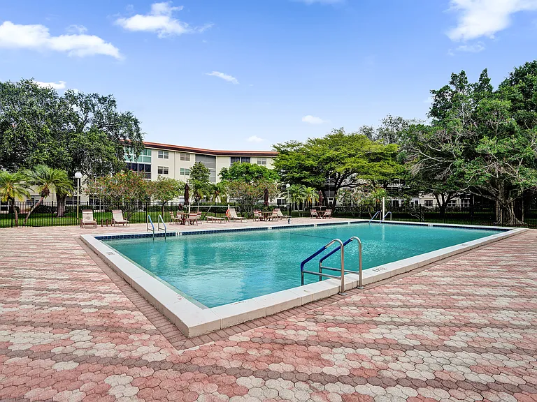 Pool behind building