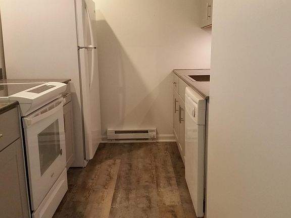 Solid surface flooring in barnwood