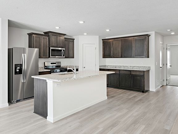 This kitchen comes complete with stainless steel appliances