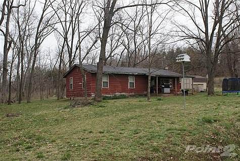 Needs a Face lift, with New Siding and Roof, This could be YOUR DREAM HOME.  There are New windows (except one), Heat/Air, and hot water heater has been replaced. New flooring, and tile in the new bath.