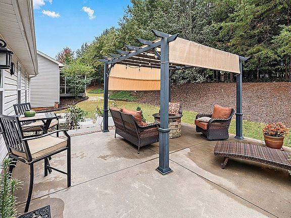 Backs up to 30 acres of woods