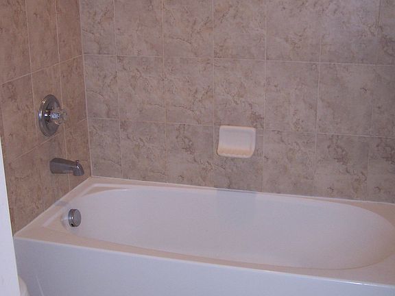 All bathrooms with custom tile