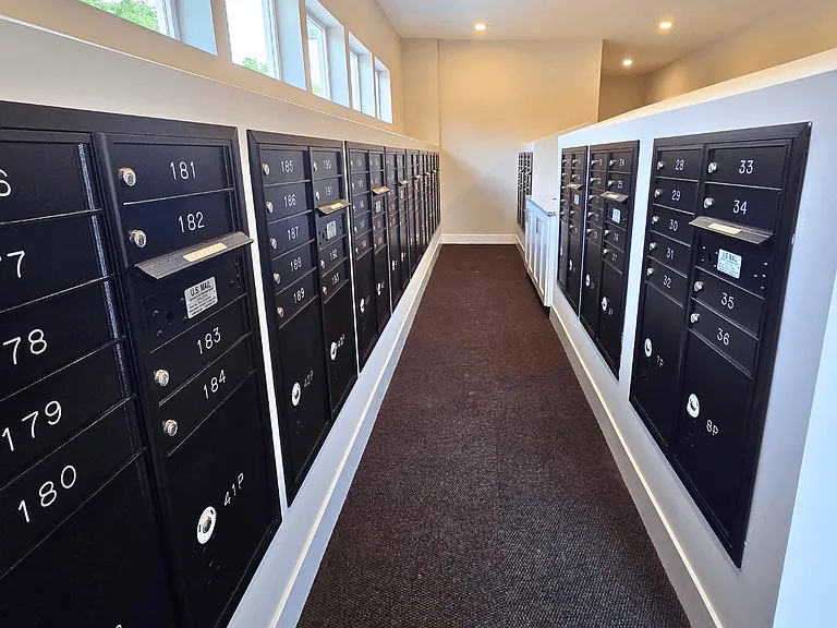 Secure mailboxes and package area at Greenwood Commons.