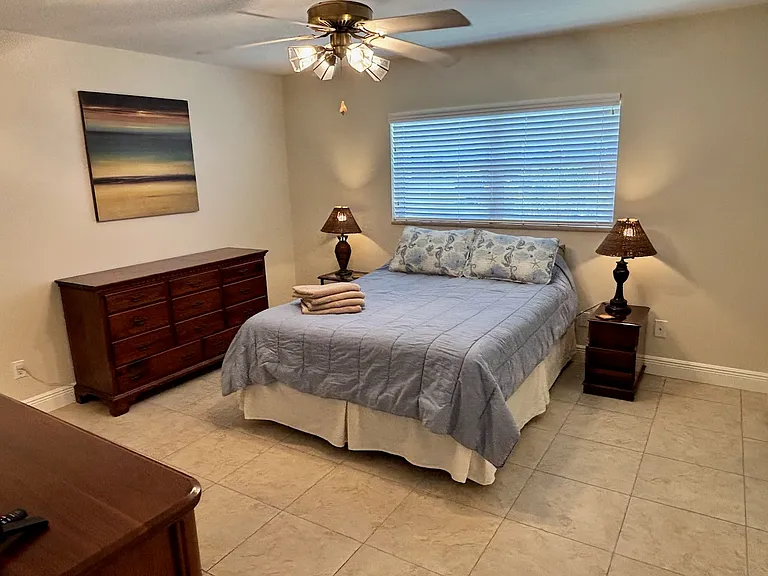 Master bedroom with his and her dressers