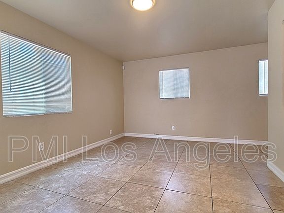 4th image of 10312 S San Pedro St