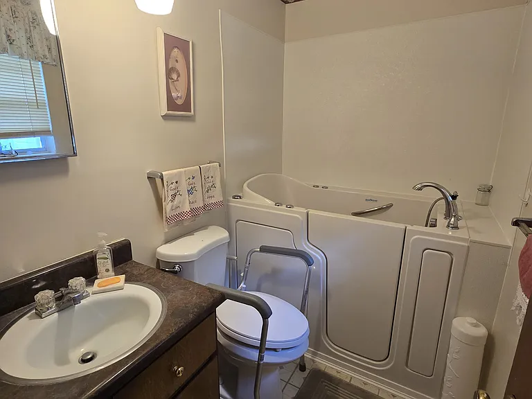 Master bedroom comes with medicine cabinet and the accessibility safety rails on the toilet unless requested to be removed.