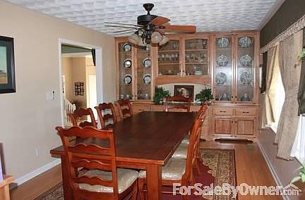 Dining Room : Formal Dining room- Beautiful custom maple cabinets as china cabinet and hutch