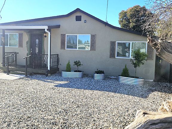 There's a nice Custom Iron Enclose front porch for the summer evenings...