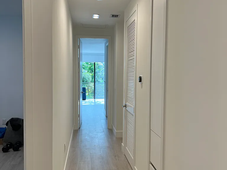 hallway from bedrooms to Master bedroom