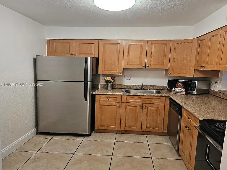5201 Geneva Way #202 — Photo 2