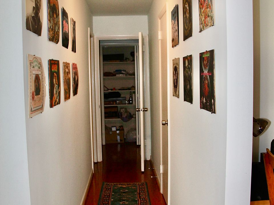 hallway to bedroom and bath