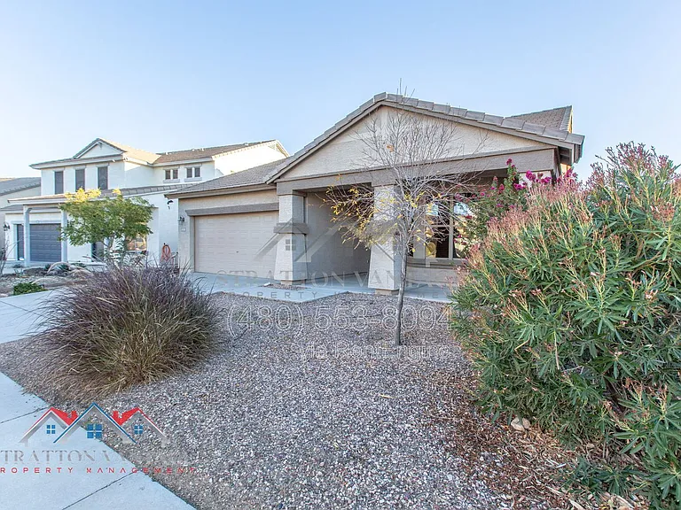 11751 W Daley Ln — Photo 2