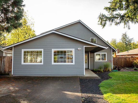 Driveway has room for 2 cars, in front of large bonus room (converted, finished garage)