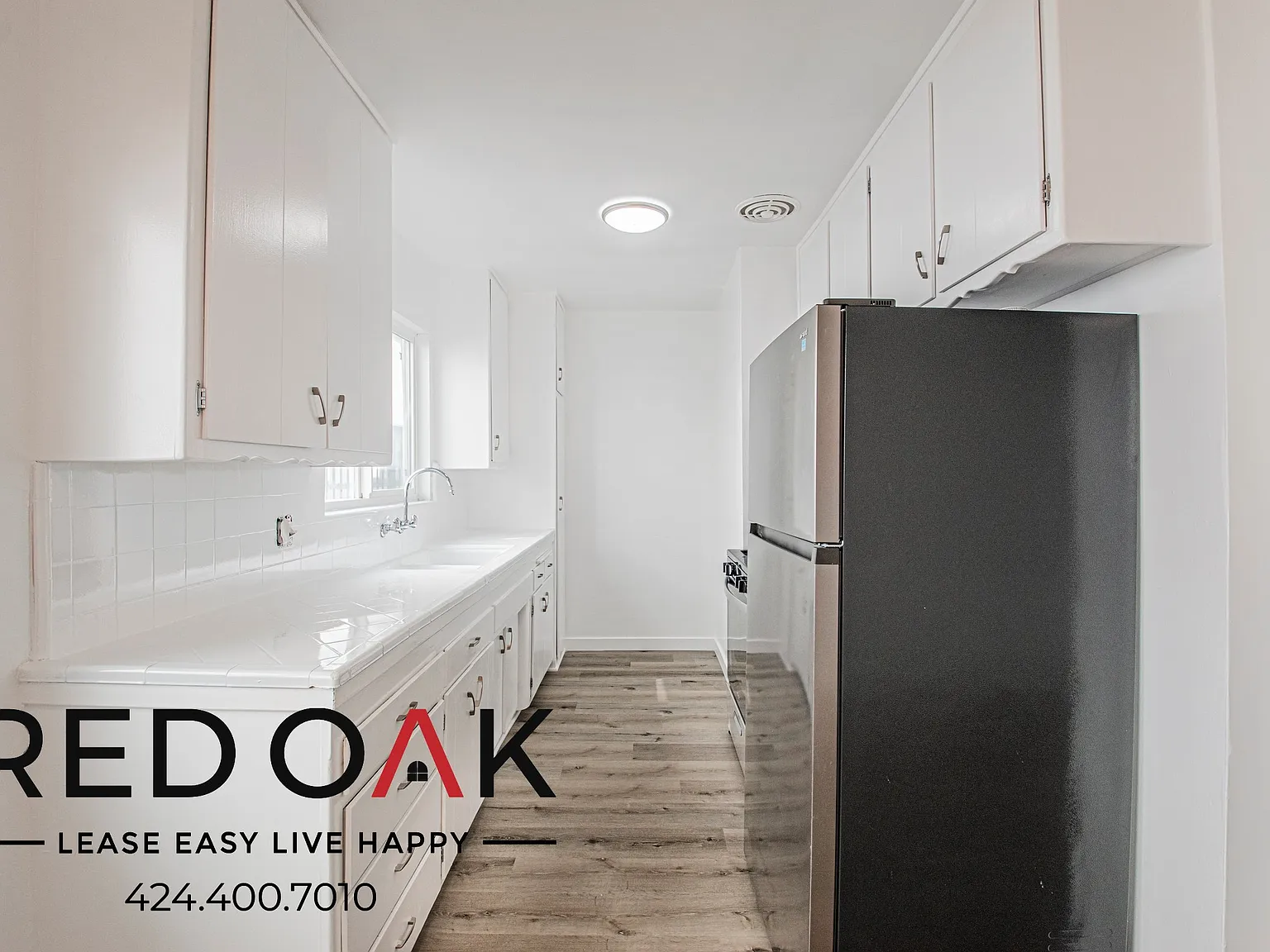 Airy 1-Bedroom with Parking Included and Hardwood-Style Floors in the Heart of Koreatown! — Photo 3