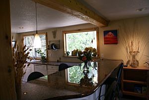 80 sq of granite in the remodeled Kitchen