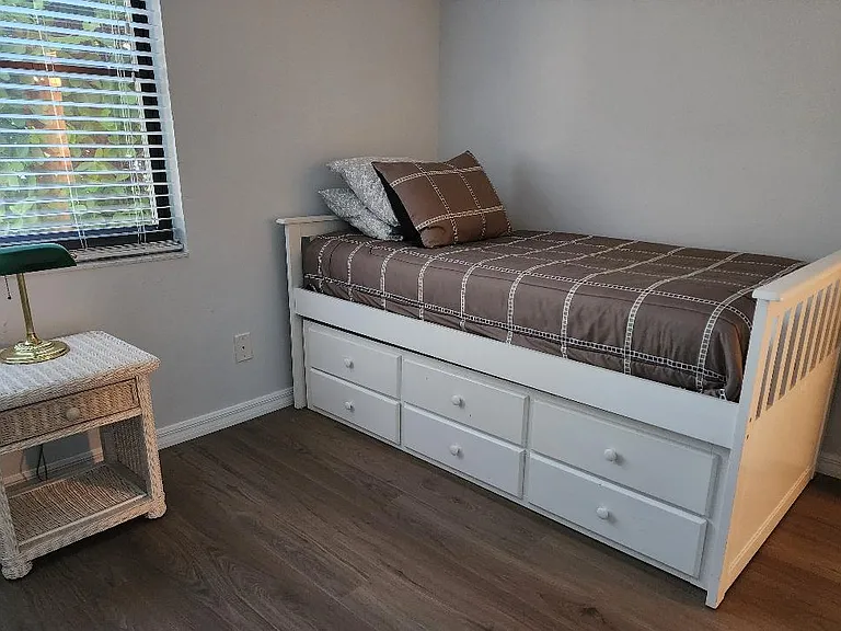 Third bedroom with 2 adult size twin beds in trundle bed. Bottom bed pulls out easily to create sleeping for 2.