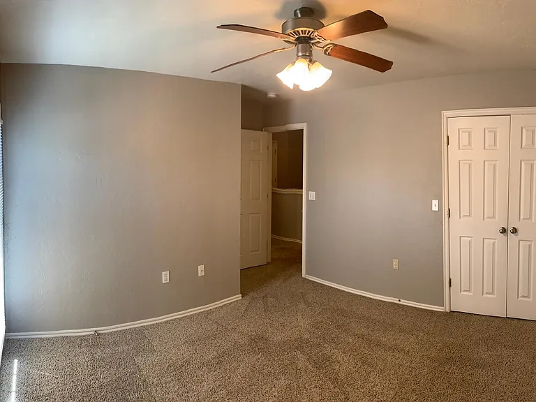 2nd Bedroom with doorway to balcony