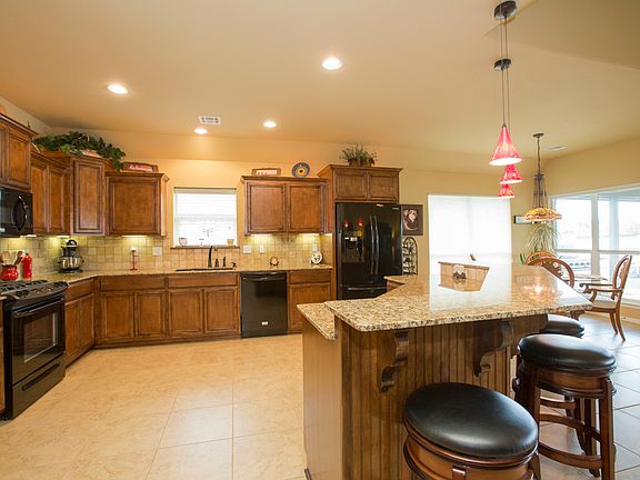 Dine-in kitchen with granite counters