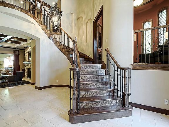 Entry with spiral staircase