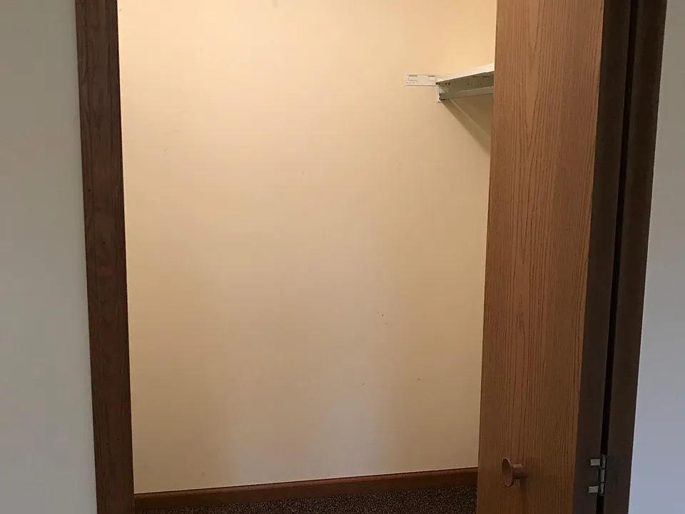 Walk-in closet in bedroom.