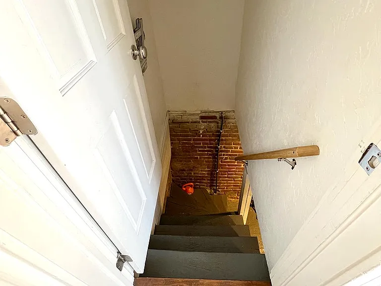 The stairs leading to the basement.