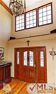 Entry way with lovely large window to bring in the light