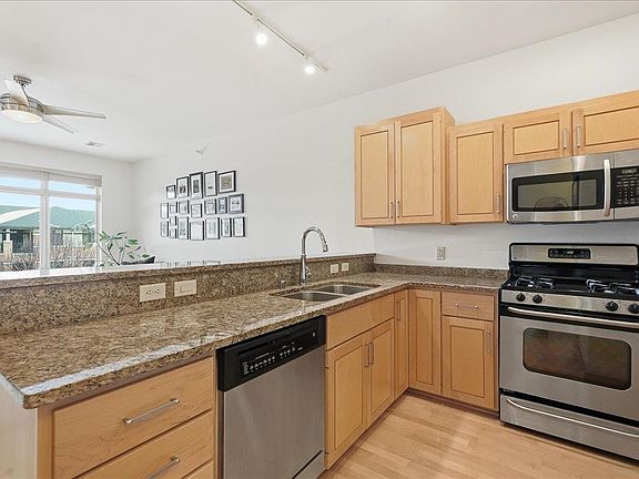 5th image of 6767 Frank Lloyd Wright Ave APT 305
