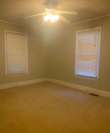 Carpet in one bedroom.