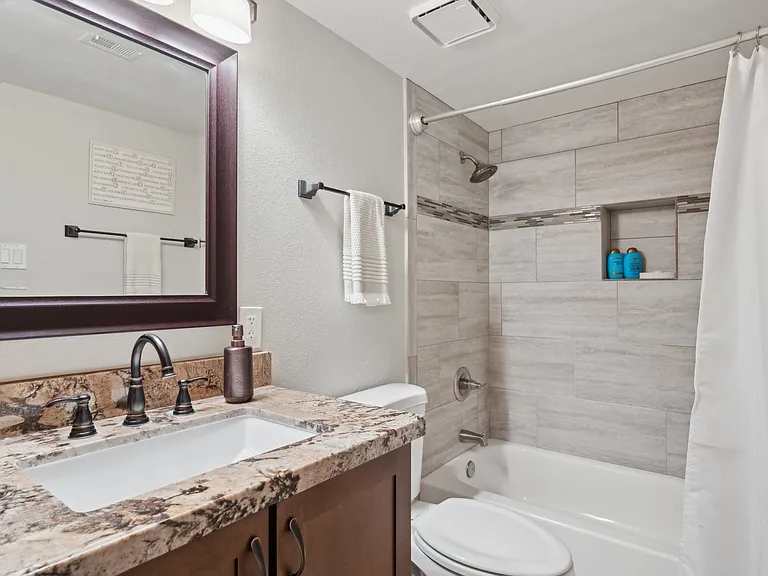 Second bathroom- Full bath with tons of storage!