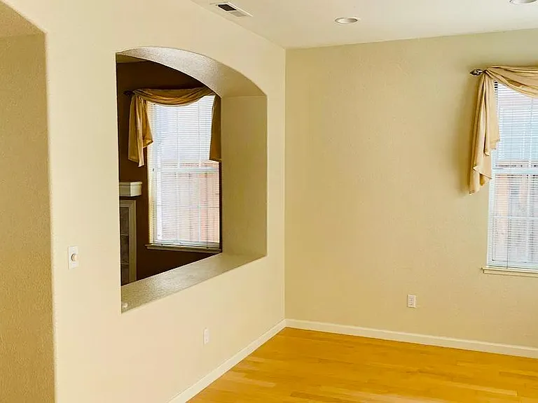 Next to the living room is the dining room.