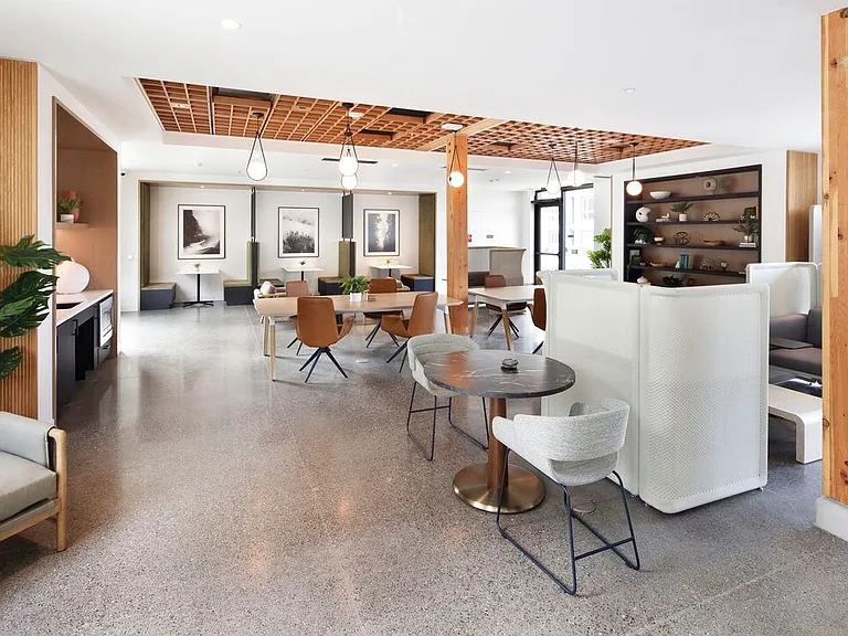 Co-working lounge with multiple seating areas