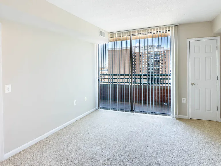 Carpeted Bathroom with Balcony